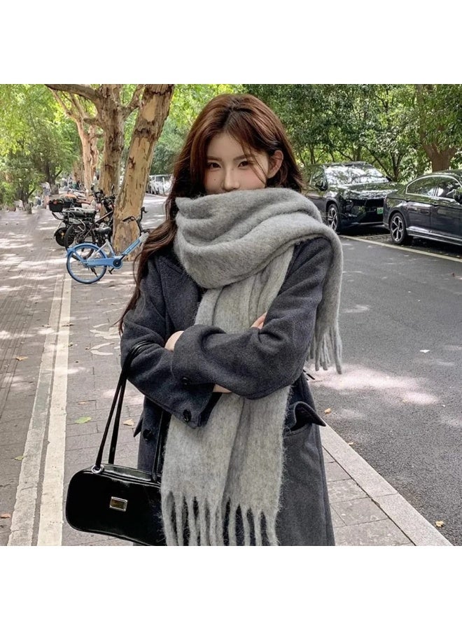 Luxuria A stylish, light gray, one-piece women's scarf, perfect for autumn and winter. This thick, double-sided scarf is warm and cozy, ideal for the office or everyday wear. A classic scarf to keep you warm, this large, curly gray scarf is a popular and warm winter accessory. - Image 2